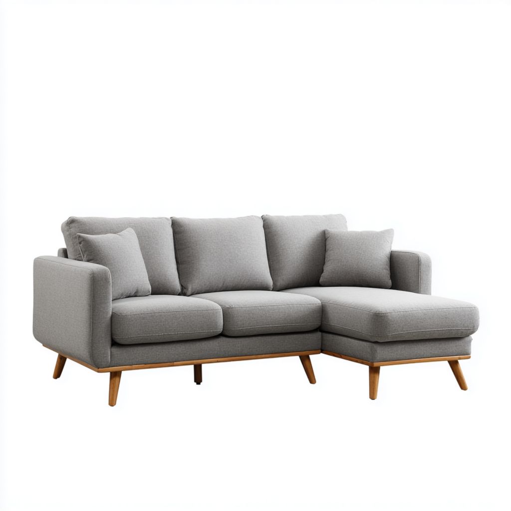 Sofá de esquina gris de tela con chaise longue y 2 cojines decorativos