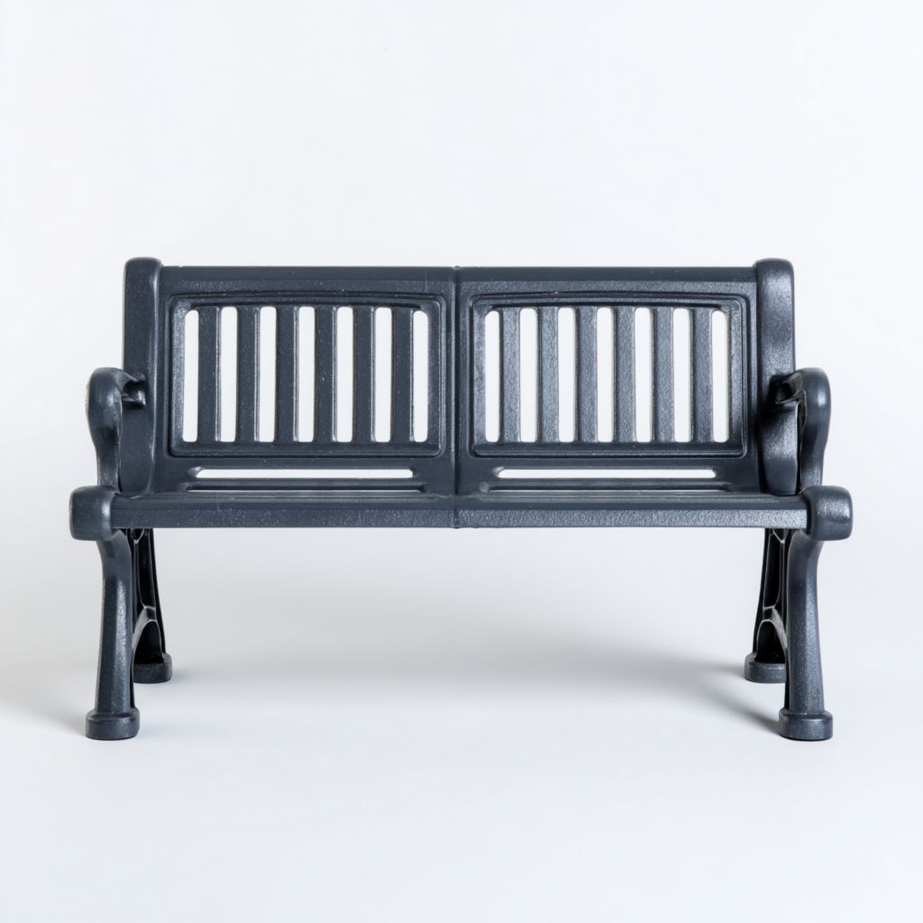 Banco de jardín de estructura metálica gris, diseño de dos plazas, ideal para exteriores