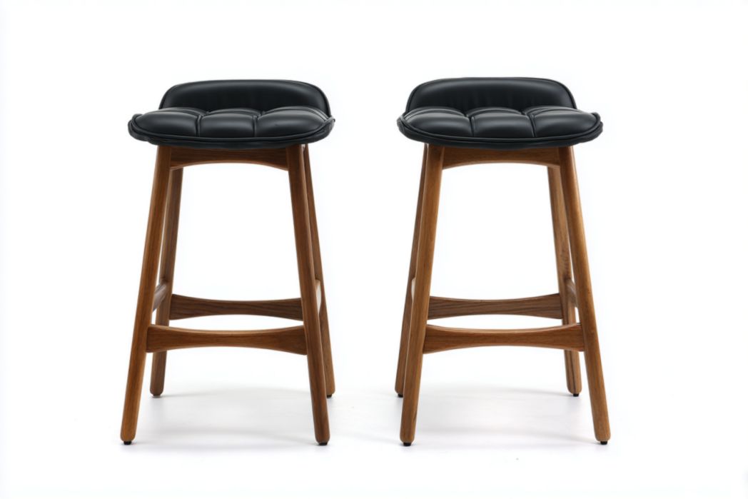 Juego de 2 taburetes de bar con asiento acolchado negro y estructura de madera, sin respaldo