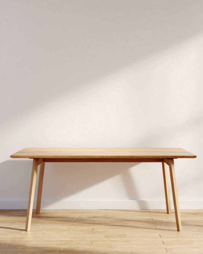 Mesa de centro rectangular roble claro con cantos redondeados y patas inclinadas, 120×60×42 cm