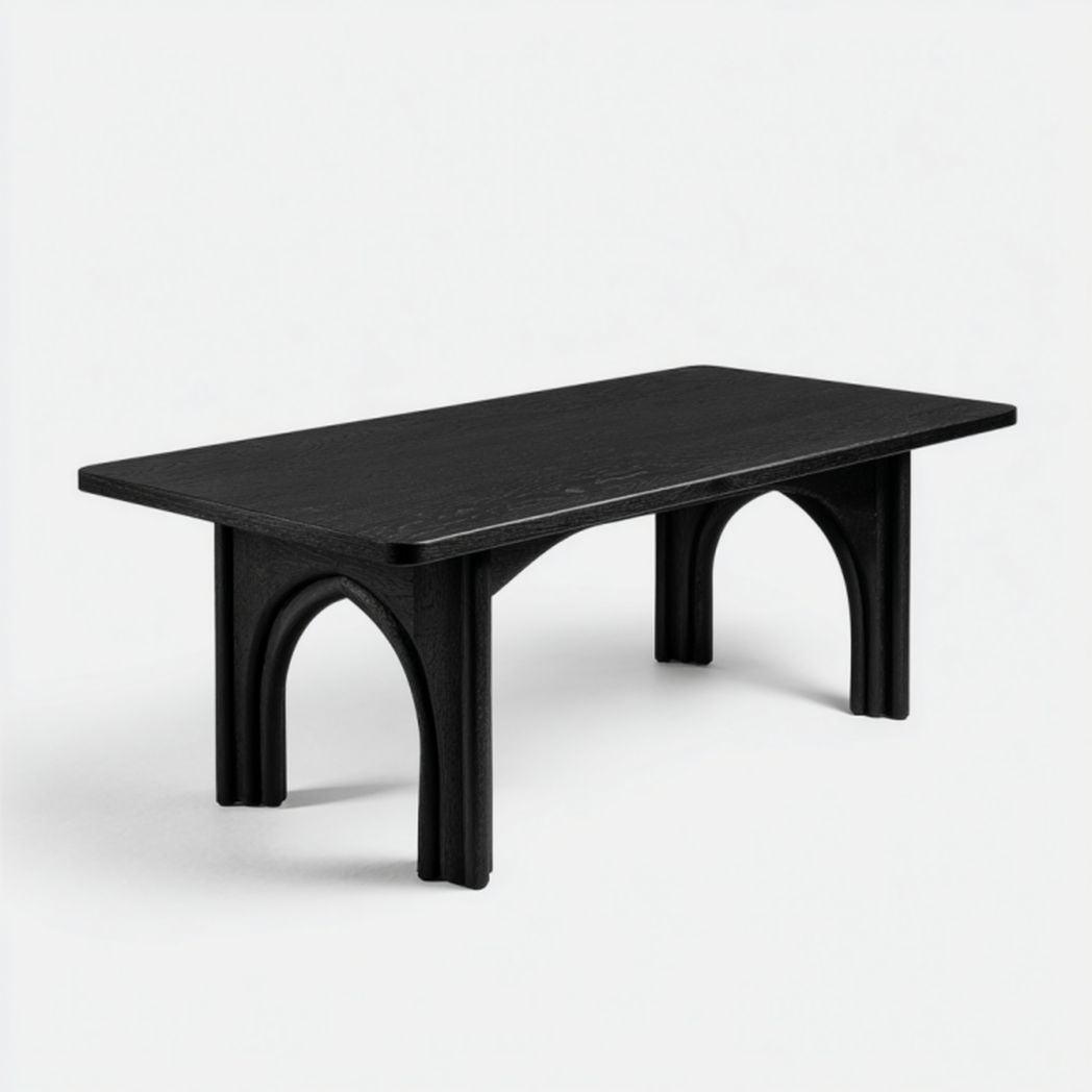 Escritorio de madera color negro con patas en diseño arqueado