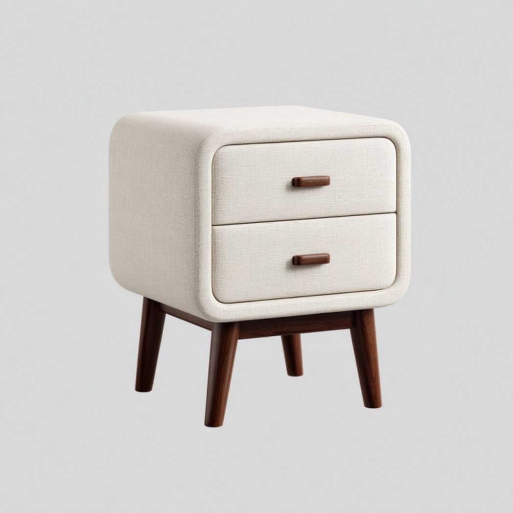 Mesita de noche con 2 cajones en color marfil y patas de madera oscura